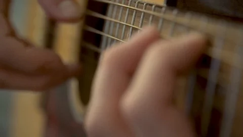 Playing acoustic guitar 스톡 동영상 115796353