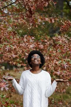 Playing in the Autumn leaves Stock Photos