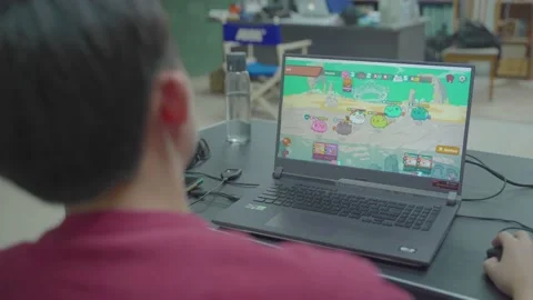 Playing Axie Infinity NFT-based Online Video Game Stock Footage 160544468