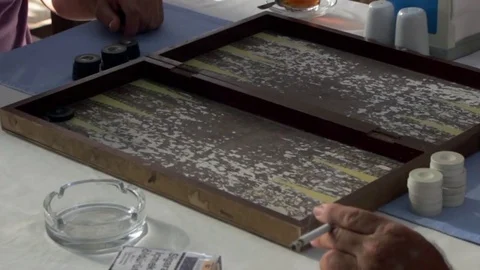 Playing backgammon in a bar Stock Footage 85299719