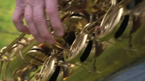 Playing bariton saxophone Stock Footage 137862937