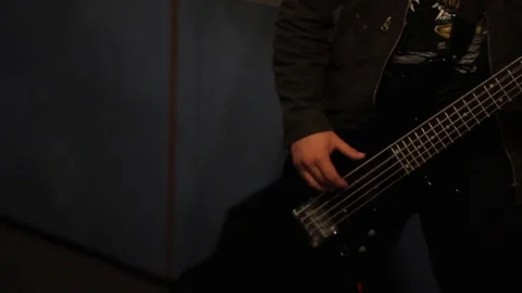 Playing bass Stock Footage 77047467