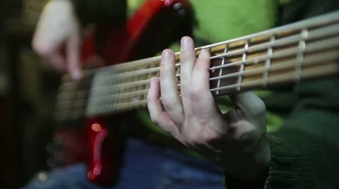 Playing bass guitar Stock Footage 44208402