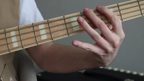 Playing bass guitar Stock Footage 333462690