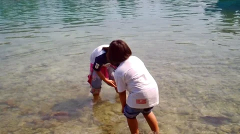 Playing in Beach Stock Footage 7812636