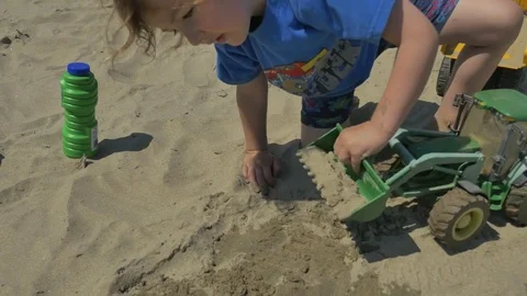 Playing on the beach Stock Footage 83629133