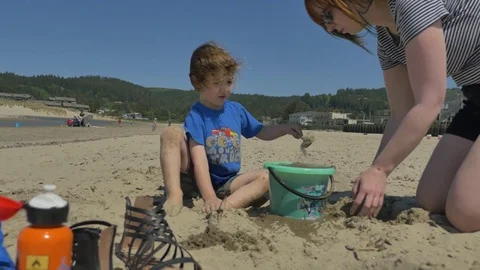 Playing on the beach Stock Footage 83629164