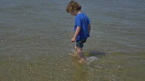 Playing on the beach Stock Footage 83629368