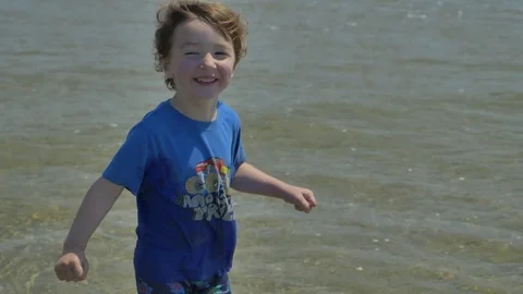 Playing on the beach Stock Footage 83629404
