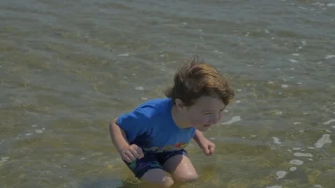 Playing on the beach 動画素材 83629436