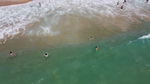 Playing in the beach Stockbeeldmateriaal 135054423