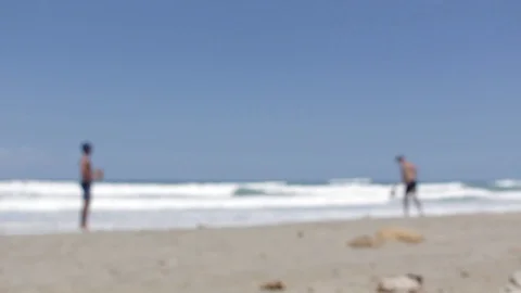 Playing beach game ball Stock Footage 98677261