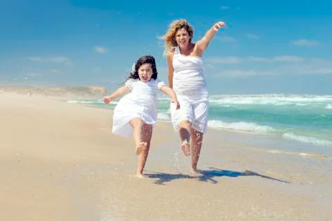 Playing on the beach Stock Photos