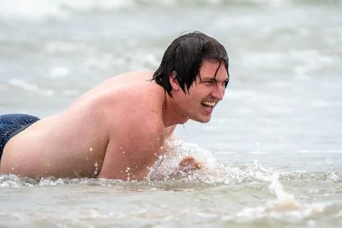 Playing on the beach Stock Photos