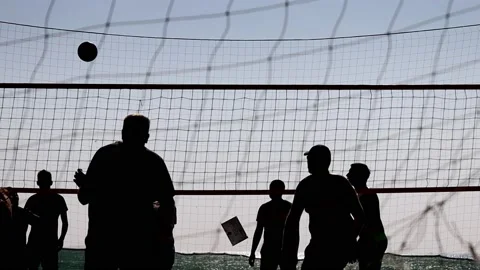 Playing beach voleyball Stock Footage 226800116