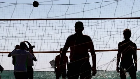 Playing beach volleyball Stock Footage 226800119