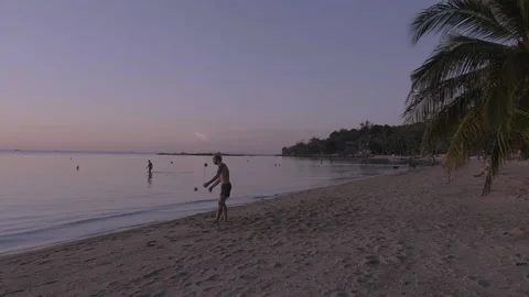 Playing at the beach while sunset 動画素材 138667243