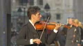 Playing a beautiful violin in Belgrade in the afternoon 4k or 4k+ Resolution