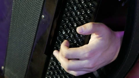 Playing on a big accordion. Stock Footage 143306523
