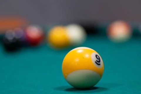 Playing biliard in a pool Stock Photos