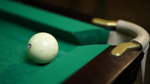 Playing billiard game. White pool balls close-up on green billiards table for Stock-Footage 270074880