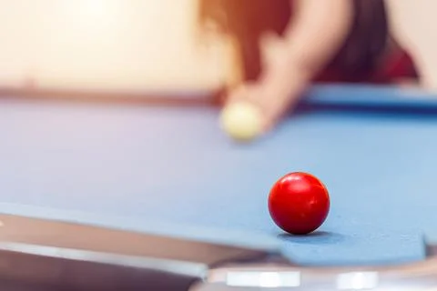 Playing Billiard or Pool Snooker Table closeup at red ball aim shot.Busines.. Stock Photos