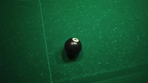 Playing billiards, blowing a cue on the ball, the ball hit the pocket, the ball Stock Footage 77282713