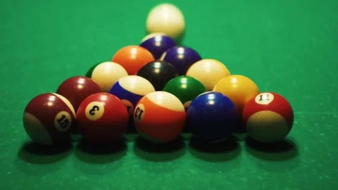 Playing billiards, blowing a cue on the ball, the ball hit the pocket, the ball Vidéo 77283418