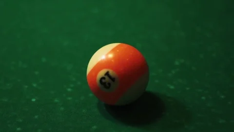 Playing billiards, blowing a cue on the ball, the ball hit the pocket, the ball Stock Footage 77283510