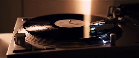 Playing Black Vinyl Record On A Record Player Wide 4K Stock Footage 118570963