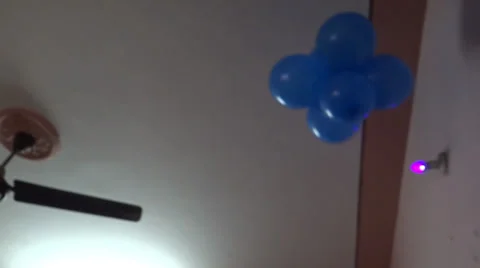 Playing with Blue Baloons Stock Footage 32679213