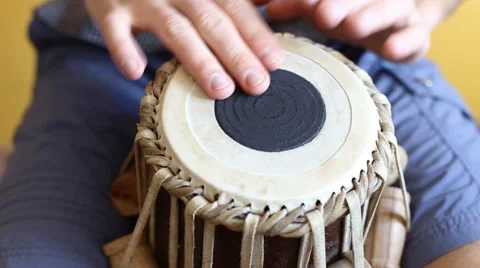 Playing Bongo drum close up HD stock footage. Hand tapping a Bongo drum in close Stock Footage 61176069