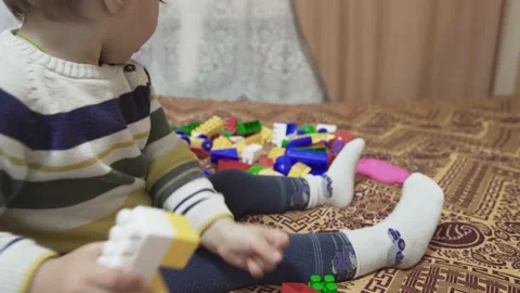 Playing boy with constructor Stock Footage 144022096