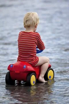 Playing on a car Stock Photos