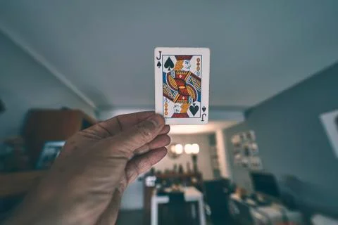Playing card in a hand Stock Photos