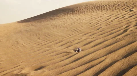 Playing card in windy desert Stock Footage 60675527