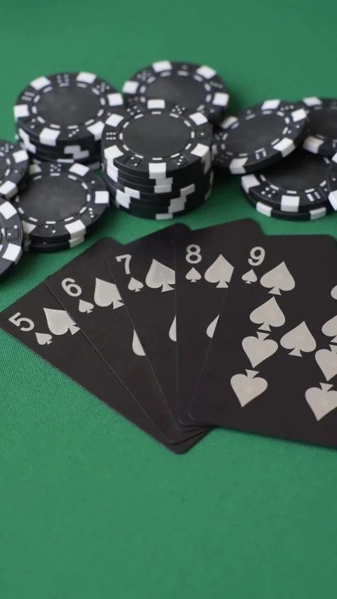 Playing cards and chips on a green cloth, a gambling game of poker. Cards and ch Stock Footage 332267715