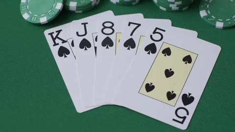 Playing cards and chips on a green cloth, a gambling game of poker. Cards and ch Stock Footage 332267747