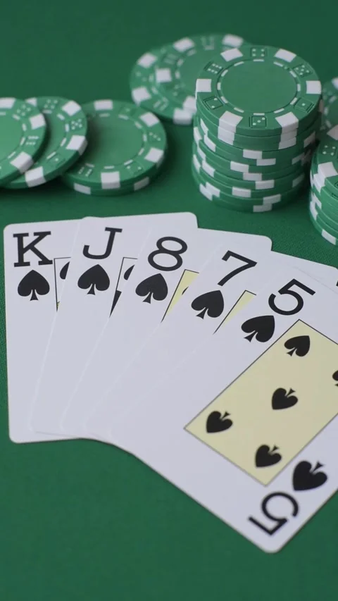 Playing cards and chips on a green cloth, a gambling game of poker. Cards and ch Stock Footage 332267762