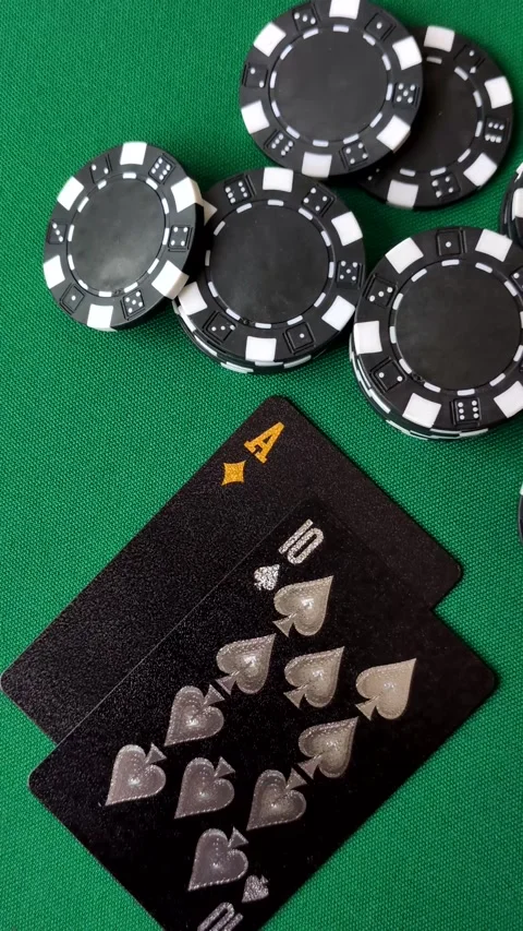 Playing cards and chips on a green cloth, a gambling game of blackjack or bacca Video stock 332267991