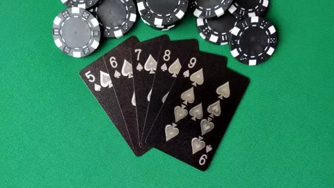 Playing cards and chips on a green cloth, a gambling game of poker. Cards and ch Stock Footage 332268016
