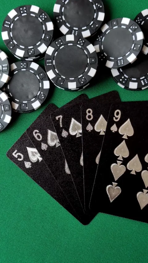 Playing cards and chips on a green cloth, a gambling game of poker. Cards and ch Stock Footage 332268034
