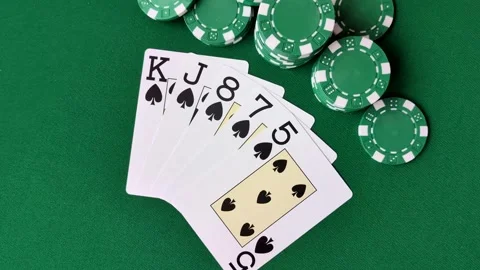 Playing cards and chips on a green cloth, a gambling game of poker. Cards and ch Stock Footage 332268116