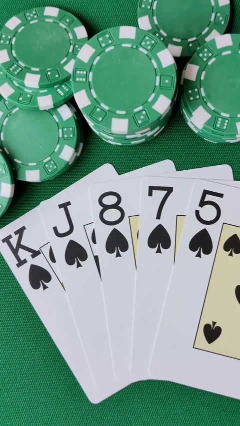 Playing cards and chips on a green cloth, a gambling game of poker. Cards and ch Stock Footage 332268141