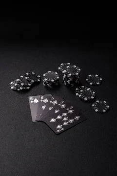 Playing cards and chips on a table, a gambling game of poker. Cards and chips Photos