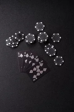 Playing cards and chips on a table, a gambling game of poker. Cards and chips Photos