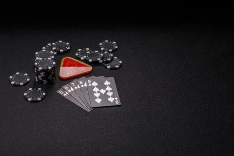 Playing cards and chips on a table, a gambling game of poker. Cards and chips Photos