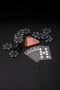 Playing cards and chips on a table, a gambling game of poker. Cards and chips Stock Photos