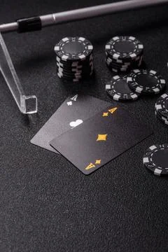 Playing cards and chips on a table, a gambling game of blackjack or baccara.. Photos
