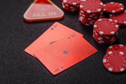 Playing cards and chips on a table, a gambling game of blackjack or baccara.. Photos